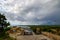 Dramatic clouds over the landscape of croatia with rain in the distance