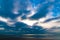 Dramatic cloudscape reflecting on coastline in Cote d\'Opale in France