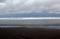 Dramatic cloudy day at the ocean on Parangritis Beach, Java, Indonesia