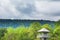 Dramatic cloudy over the tropical forest and animal watching tower hideout