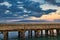 Dramatic, cloudy sky at Mala pier with Lanai in the background.