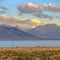 Dramatic cloudy sky over Utah Lake and mountains