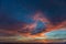 Dramatic colored sky at sunset. Moon and star in the clouds.