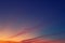 Dramatic colorful red purple to blue sunset or sunrise sky landscape. Natural beautiful cloudscape dawn background