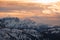 Dramatic colors effect of dolomite winter panorama at sunset with sunlit clouds