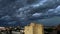 Dramatic cumulonimbus stormy clouds over cityscape Kaunas, Lithuania