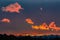 Dramatic dark blue sky with colorful clouds