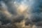 dramatic dark magical sky with cumulus clouds and orange backlighting. artistic image for moody atmospheric background, layout or