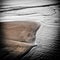 Dramatic and dark scene on a sandy beach