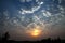 Dramatic Dawn Sun Skyscape Edge Lighted Cumulus Clouds