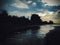 Dramatic Dusk Light Of Rural Tropical Beach View With River Beach Outlet Water Flow At The Village