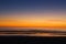 Dramatic empty seascape with vibrant contrasting colours at sunset