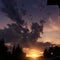 Dramatic epic sky over shadow trees