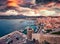 Dramatic evening cityscape of Calvi port. Amazing summer sunrise on Corsica island, France, Europe. Spectacular seascape of Medite