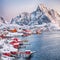 Dramatic evening cityscape of Reine town