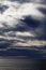 Dramatic Evening Clouds Over Calm Ocean Depoe Bay Oregon