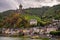 Dramatic fairytale medieval castle in Cochem Germany with Cochem village along the Mosel River.