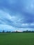 Dramatic green field of rice and beautiful sky