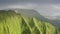 Dramatic Hawaii aerial clouds on sunny sunrise Stairway to Heaven dangerous hike