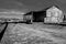 Dramatic high contrast image image of old weathered wooden storage barns on a salt mine on caribbean coast.