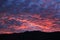 Dramatic hot pink dawn over Catalina mountains in tucson, arizona