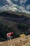 Dramatic image of a Haitian farm workers cultivating side of a mountain high in the caribbean island of the dominican republic.