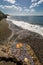 Dramatic  image of an ocean eroded home on caribbean coast