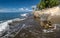 Dramatic  image of an ocean eroded home on caribbean coast