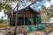 Dramatic image of old wooden shack on the shore in Los Patos park, dominican republic.