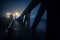 Dramatic industrial vintage river bridge at night.