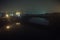 Dramatic industrial vintage river bridge scenery at night.
