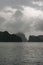 Dramatic karst islands of Halong Bay on storm weather