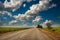 Dramatic landscape asphalt road leaving into the sky