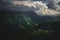 Dramatic landscape of a green valley at the foot of the Inal Plateau in the North Caucasus