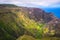 Dramatic landscape view of Na Pali coastline, cliffs and valley