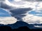 Dramatic lenticular cloud over Alpine peak