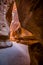 Dramatic light filters through the canyon towards the Treasury and Petra