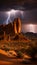 Dramatic Lightning Strikes Over Towering Desert Rock Formations