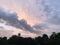 Dramatic long clouds formation and blue sky background