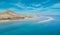 Dramatic mid level aspect aerial panoramic view of the beautiful beach, lagoon and sand dunes at Sotavento on Fuerteventura