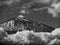 Dramatic monochrome of snowcapped Mount Teide, Tenerife and clouds