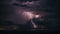 Dramatic night skies with intense lightning - AI generated