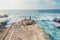 Dramatic ocean bluffs, summits with sweeping views, and silhouette of a man standing on the edge of a cliff. Montana de Oro State