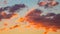 Dramatic orange clouds at sunset. Cloudscape abstract background photo.