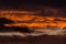 Dramatic orange dark sky cloudscape at evening dawn