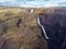 Dramatic overview of Haifoss waterfall, the fourth highest waterfall(122m) of the island, and colorful canyon situated near the
