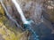 Dramatic overview of Haifoss waterfall, the fourth highest waterfall(122m) of the island, and colorful canyon situated near the