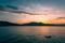 Dramatic panorama evening sky and clouds over lake at sunset