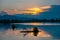 Dramatic panorama evening sky and clouds over mountain and lake at sunset