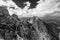 Dramatic Panoramic View Over High Mountains Top in Clouds, Black And White